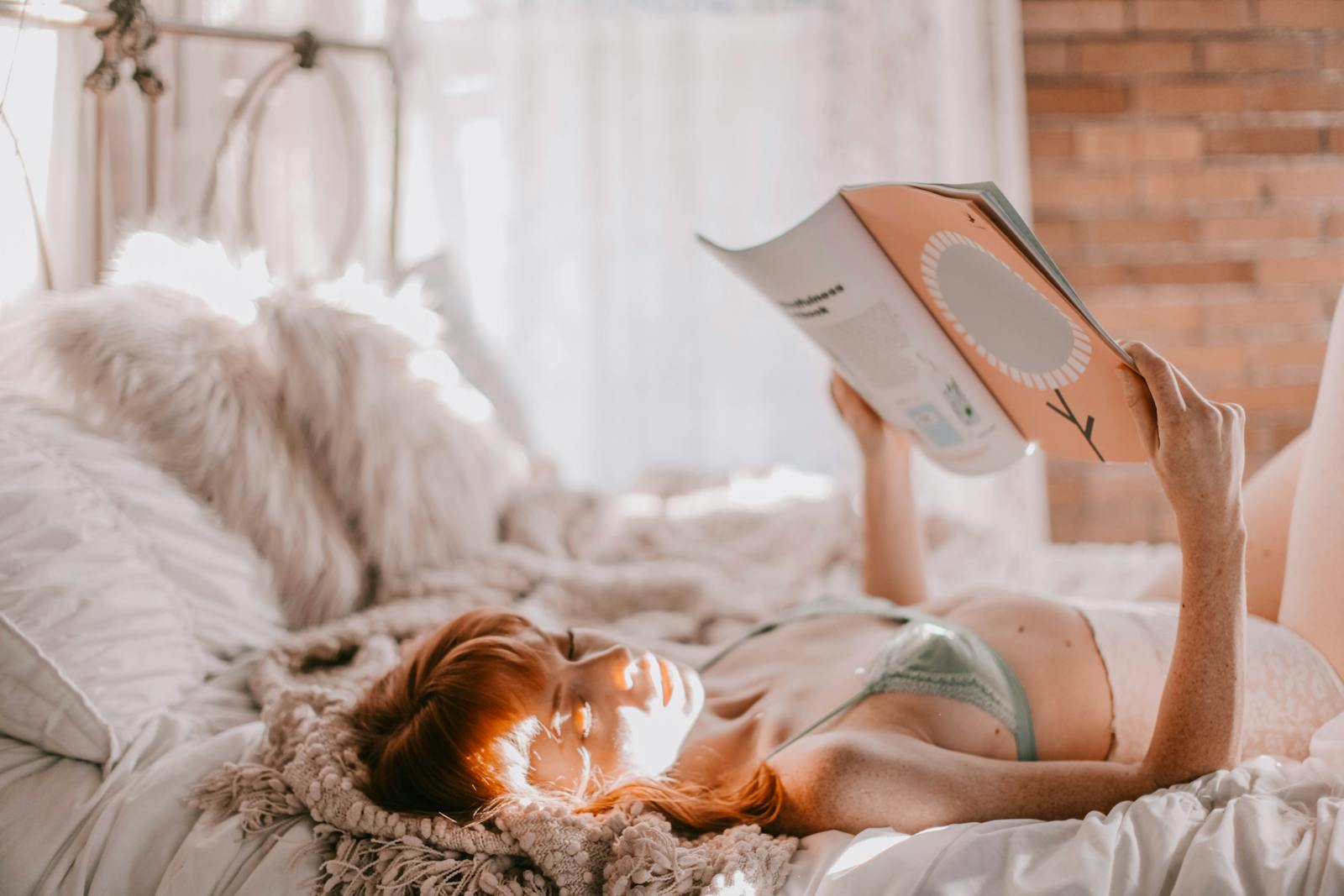 Photo of Woman Laying On Bed